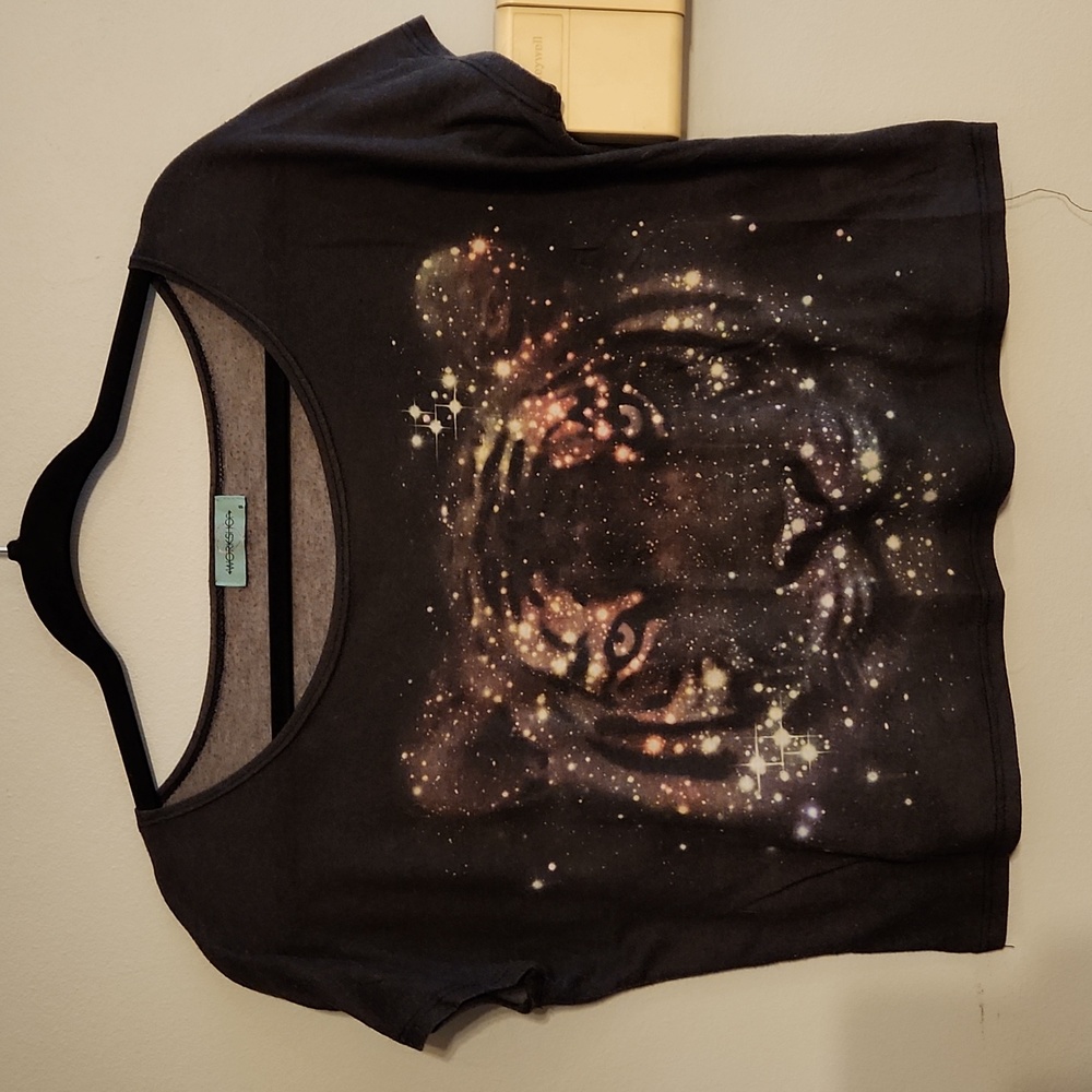 Small black galaxy tiger design crop top from delias